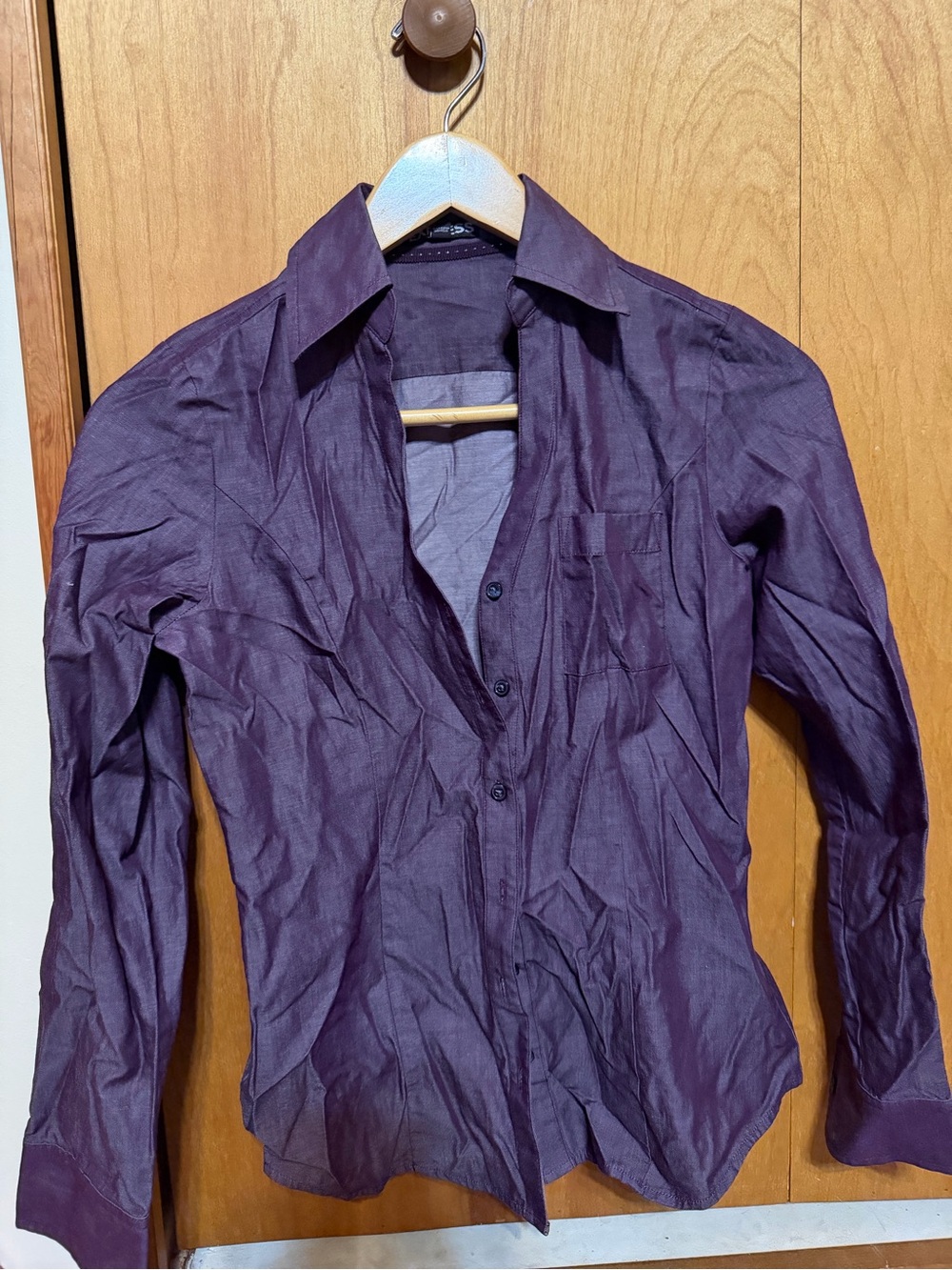 Express Women’s button up, does need to be ironed. Deep purple